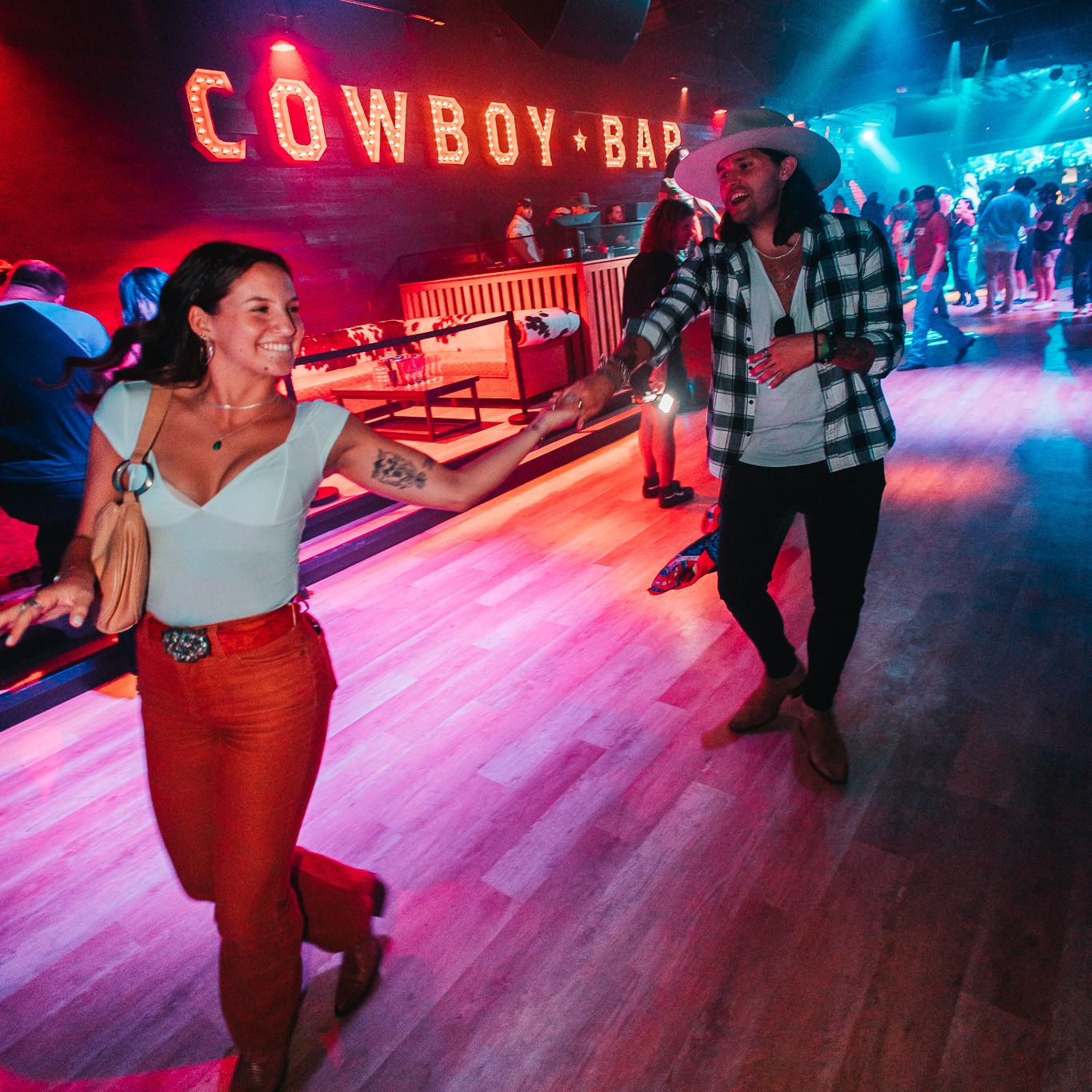 Couple dancing at PBR Cowboy Bar Nashville.