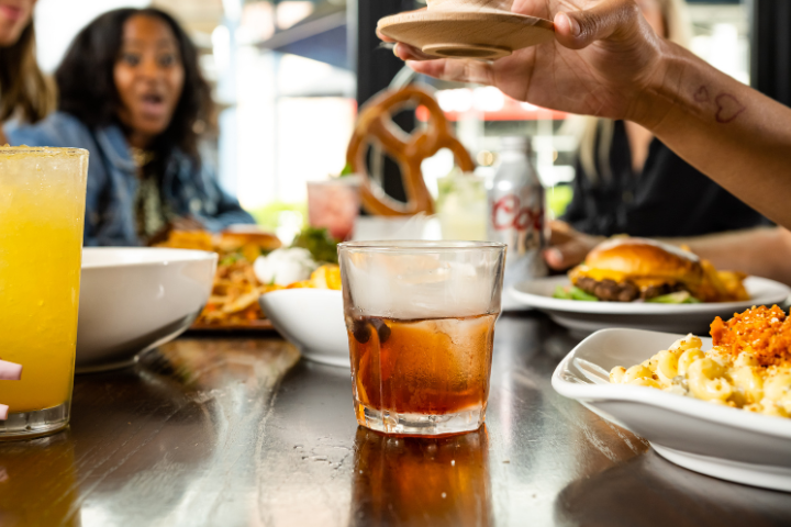 New Sports & Social menu items: burger, mac and cheese, and Crush drink.
